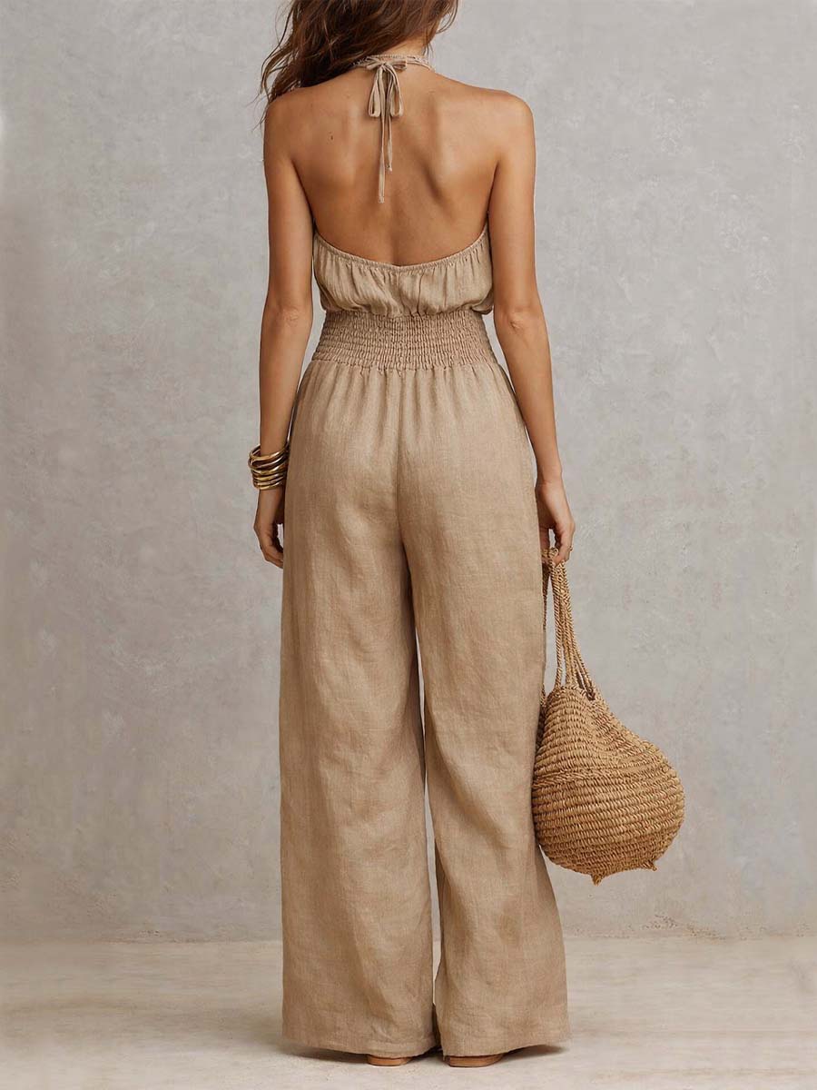 Beige jumpsuit with halter neck, gathered waist and wide-leg