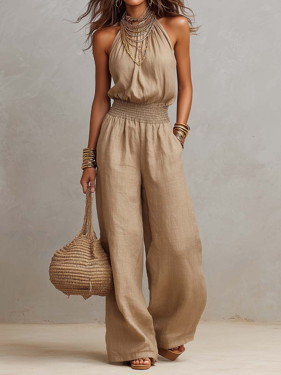 Beige jumpsuit with halter neck, gathered waist and wide-leg