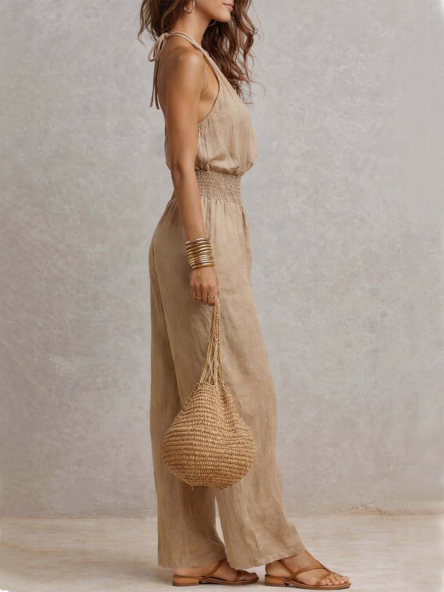 Beige jumpsuit with halter neck, gathered waist and wide-leg